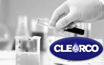 Clearco logo with flasks in the background