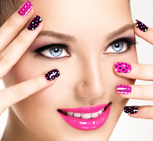 woman using fingernail polish made with silcone fluids